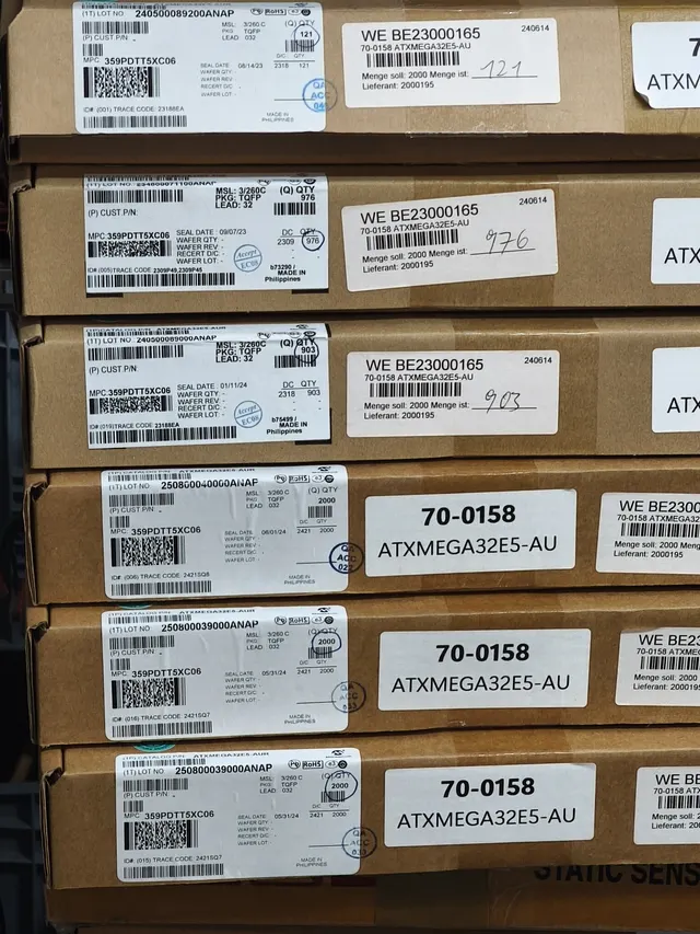 Authentic Microchip ATXMEGA32E5-AU factory cartons with quantity labels — real inventory we bought & sold